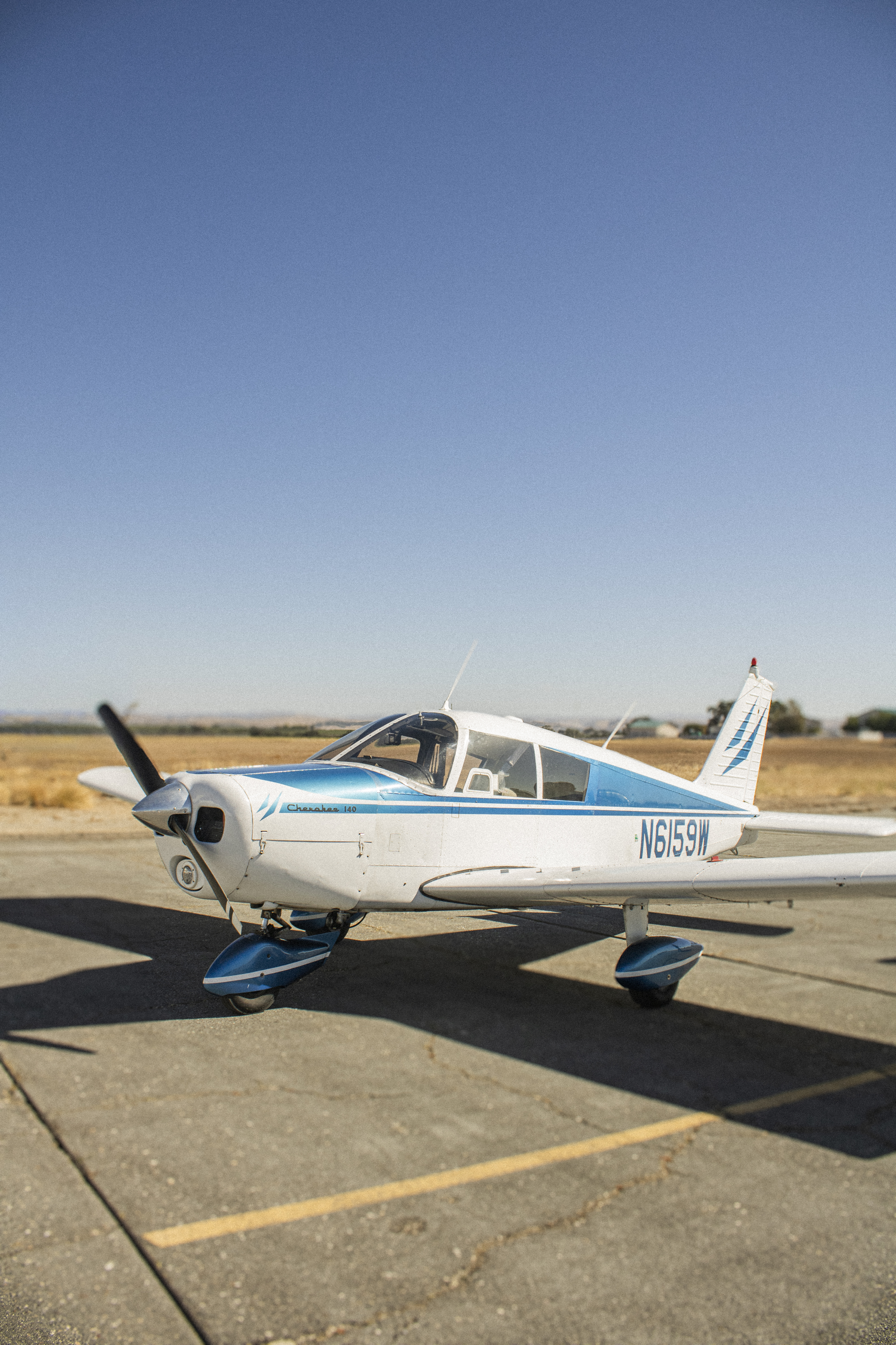 Fly High airplane near hangar